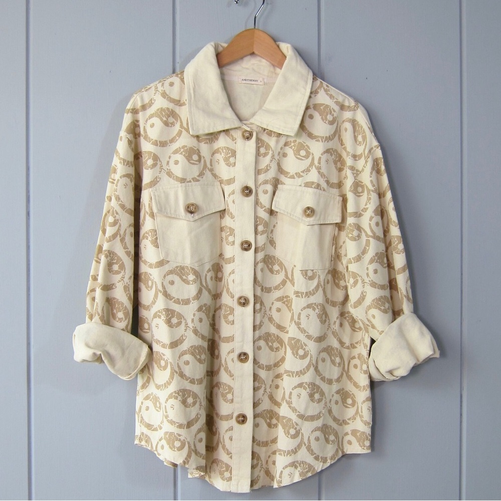 And the why button up yin yang shirt size S